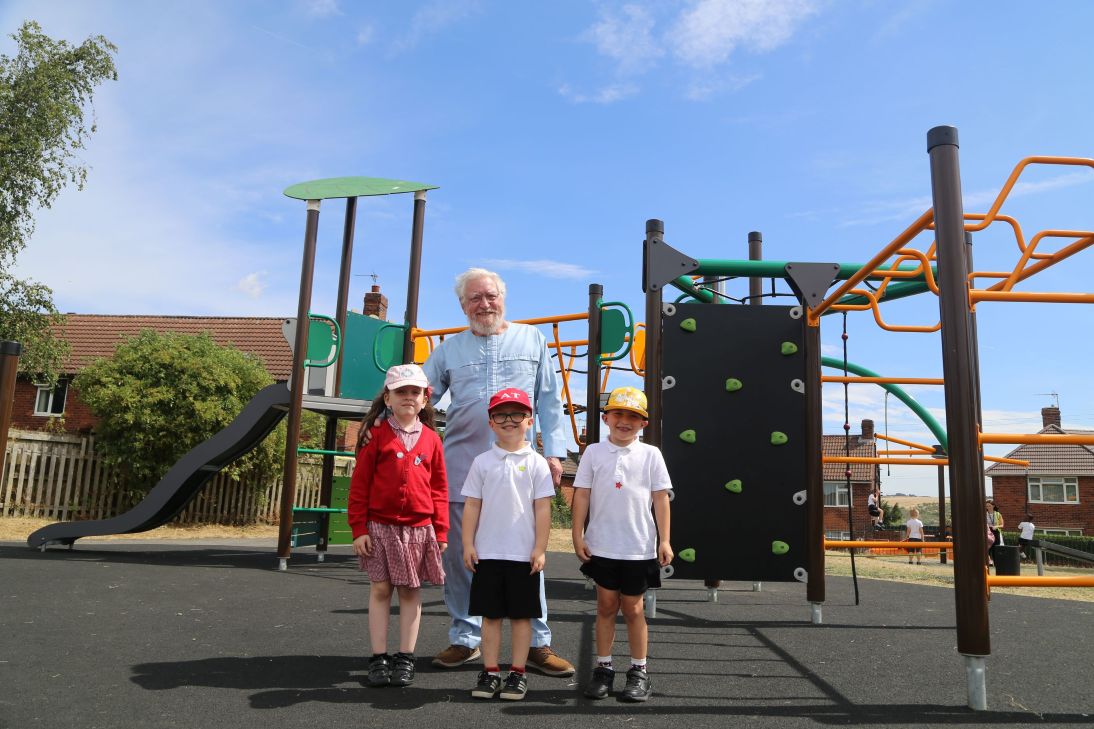Cllr Martin Stone with children from Duckmanton Primary School at the new play space