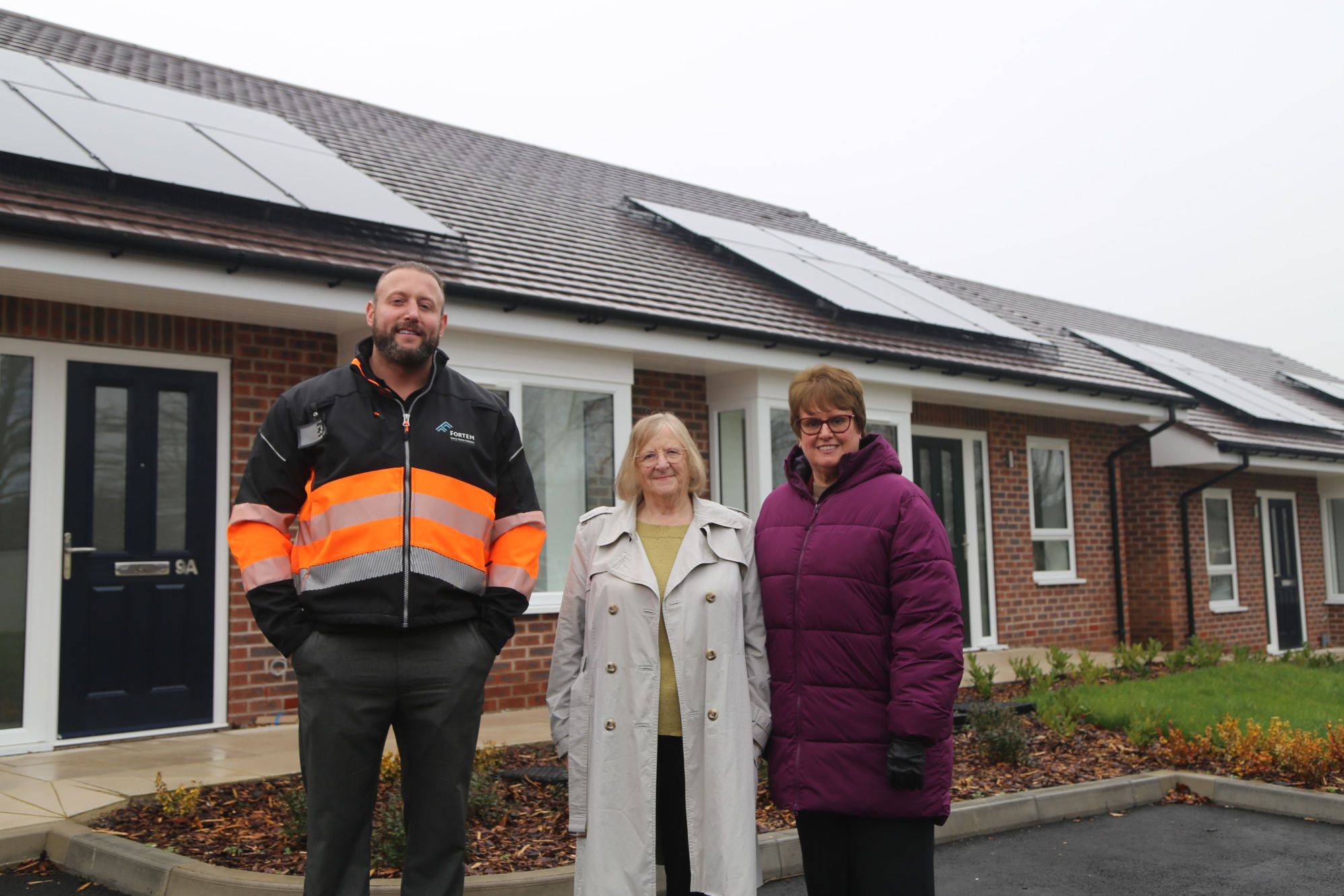 Russ Gale, Cllr Jean Innes and Cllr Tricia Gilby at the new homes on Wensley Way. 
